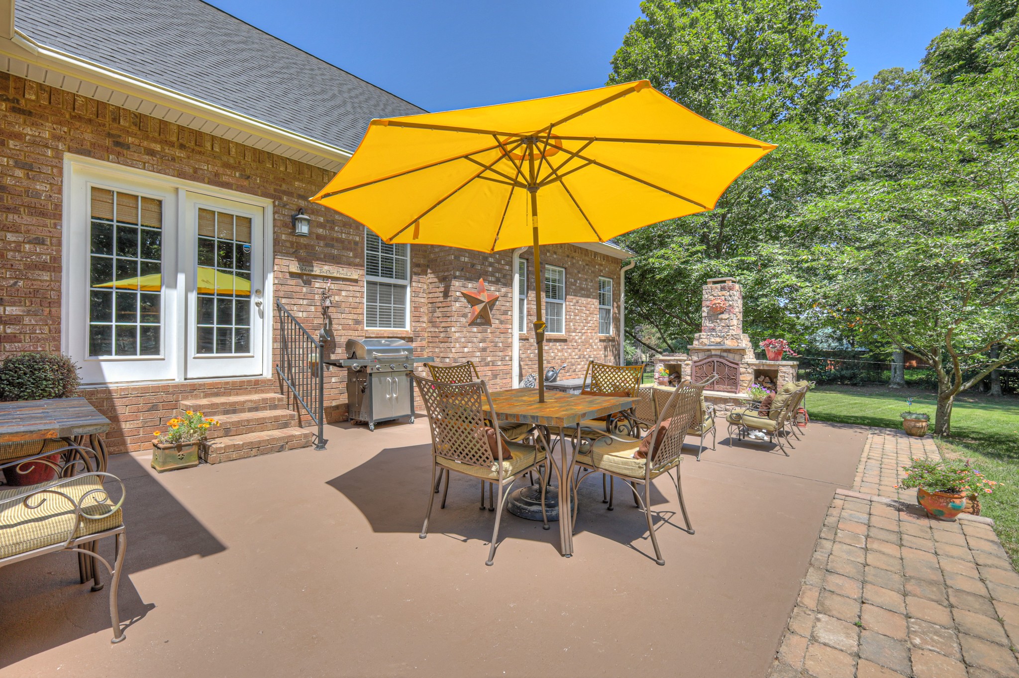 431 Conquest Road Murfreesboro, TN 37128 - Photo 44 of 55 a view of a swimming pool with a table and chairs
