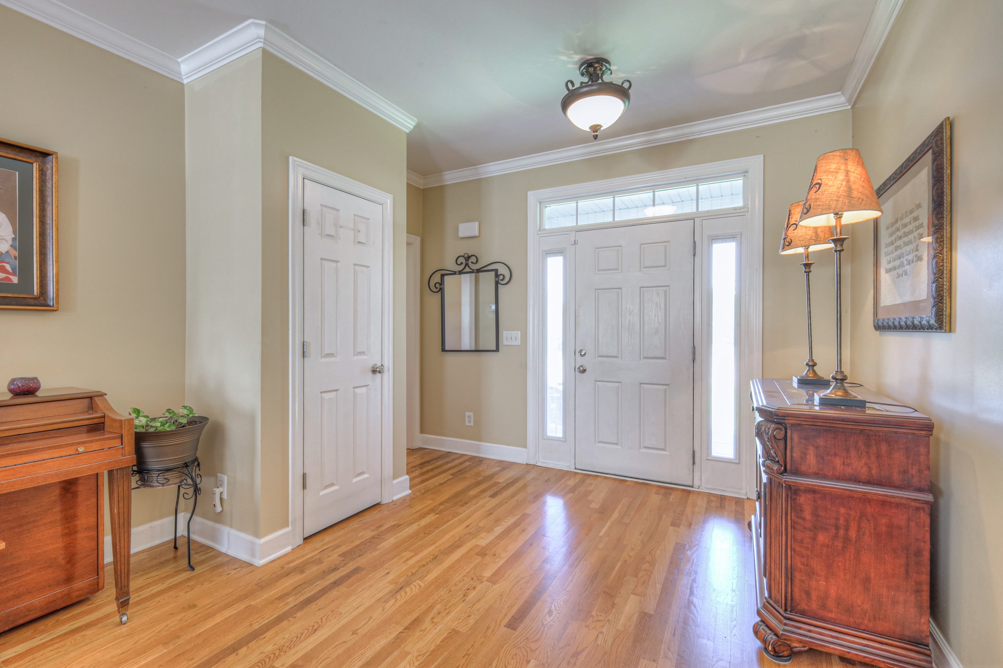 431 Conquest Road Murfreesboro, TN 37128 - Photo 6 of 55 a view of a livingroom with wooden floor and furniture