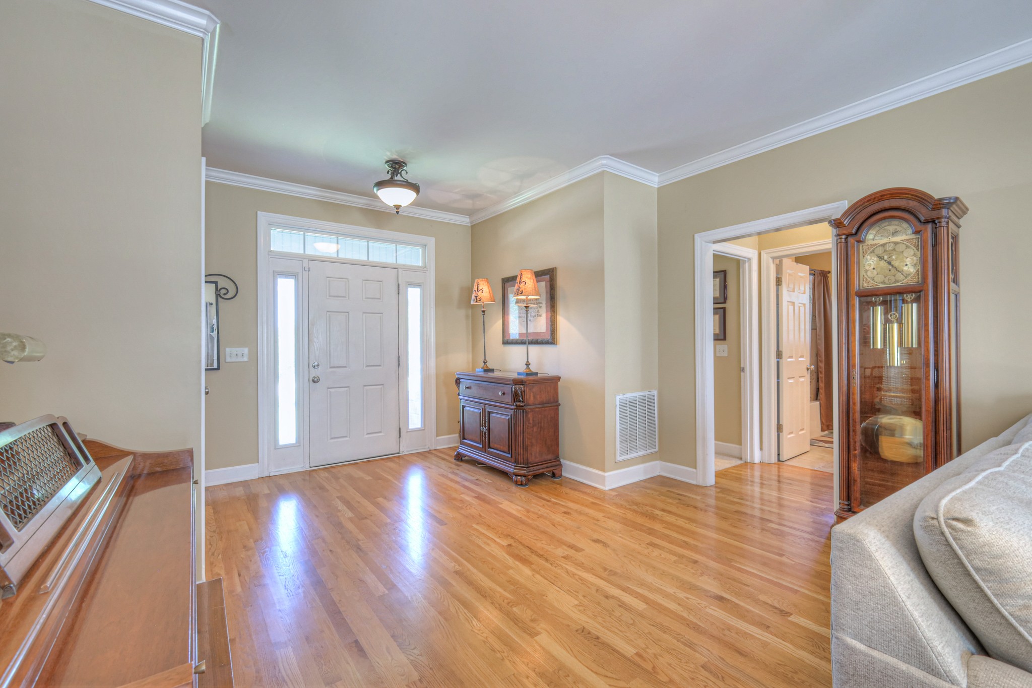 431 Conquest Road Murfreesboro, TN 37128 - Photo 7 of 55 a view of a livingroom with wooden floor and furniture