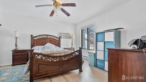 a bedroom with a bunk bed and a dresser