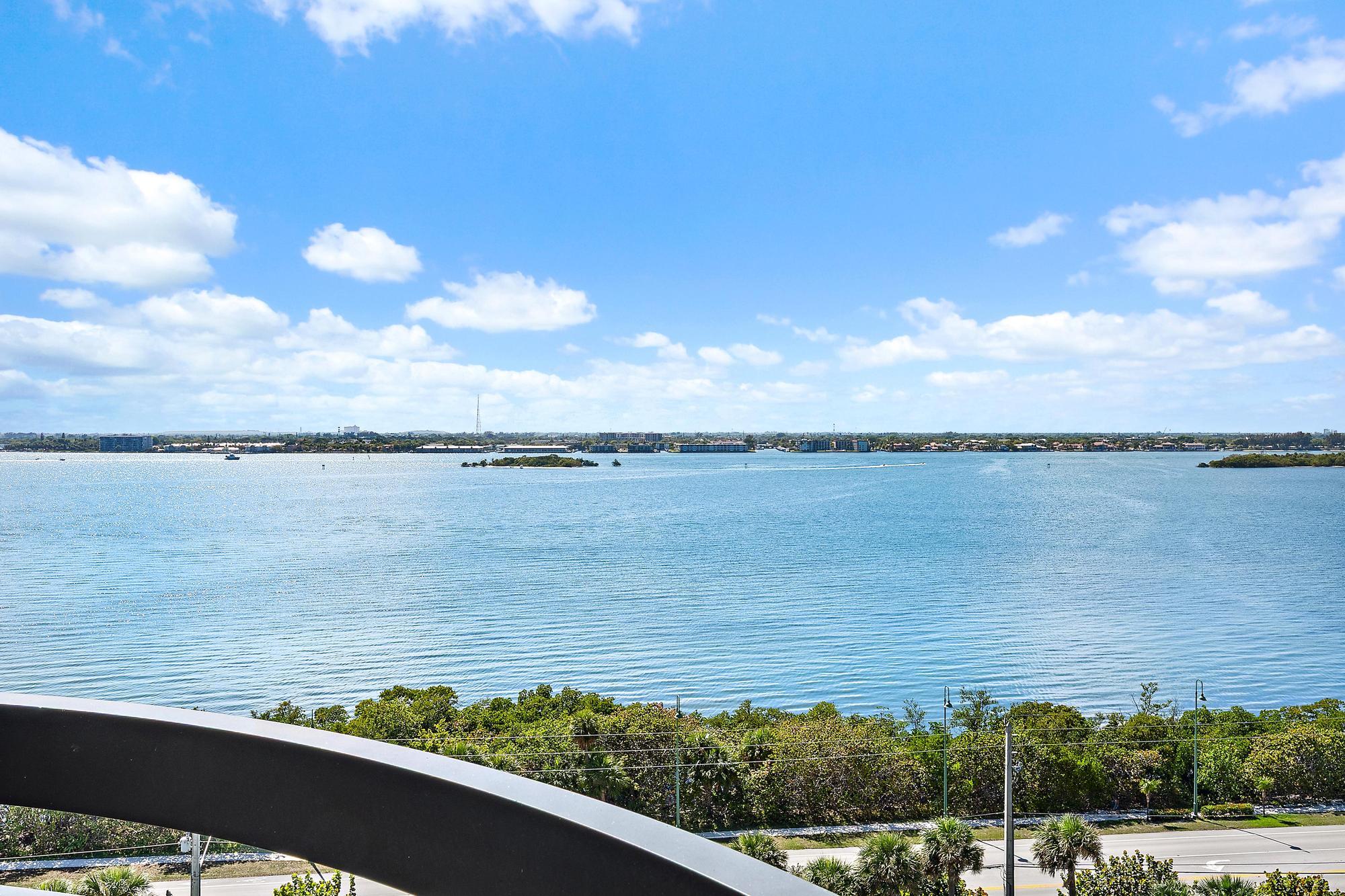 5380 North Ocean Drive, Unit 10J Singer Island, FL 33404 - Photo 17 of 37 a view of a lake from a balcony