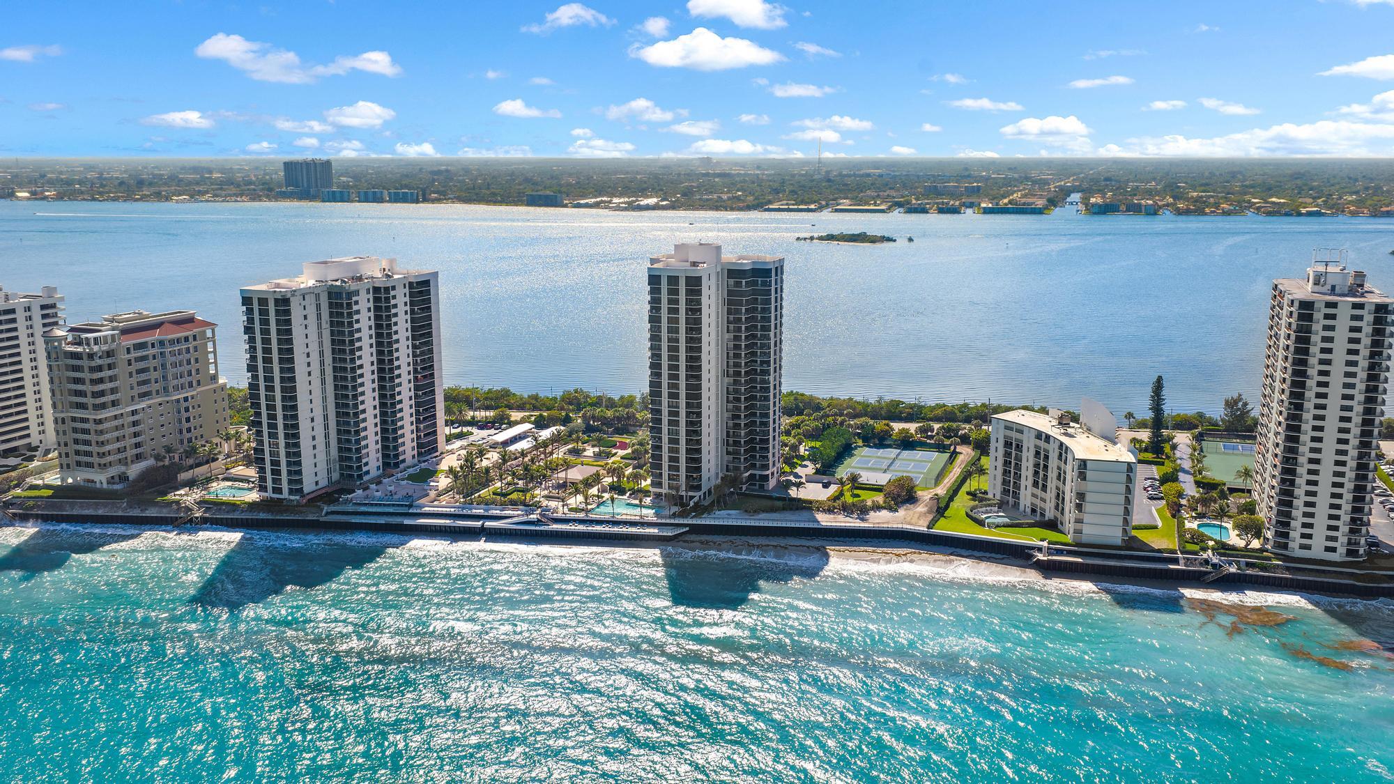 5380 North Ocean Drive, Unit 10J Singer Island, FL 33404 - Photo 36 of 37 a view of outdoor space with seating area and lake view