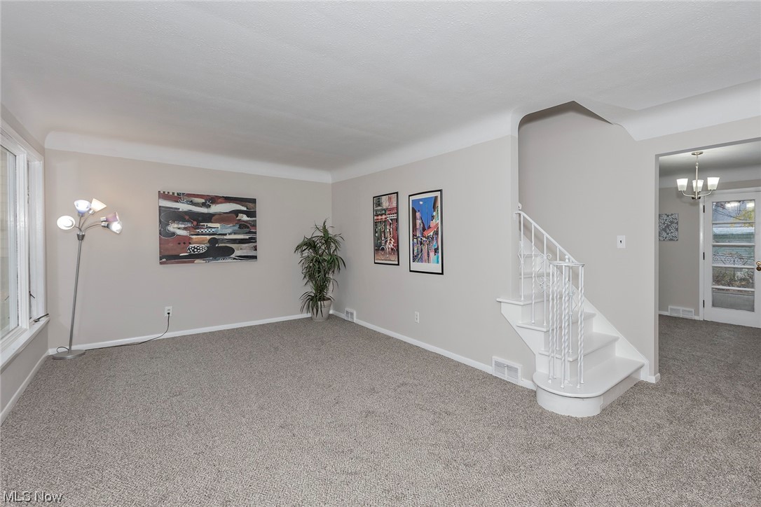 4402 Bayard Road South Euclid, OH 44121 - Photo 3 of 27 Spacious living room with new carpeting 2023