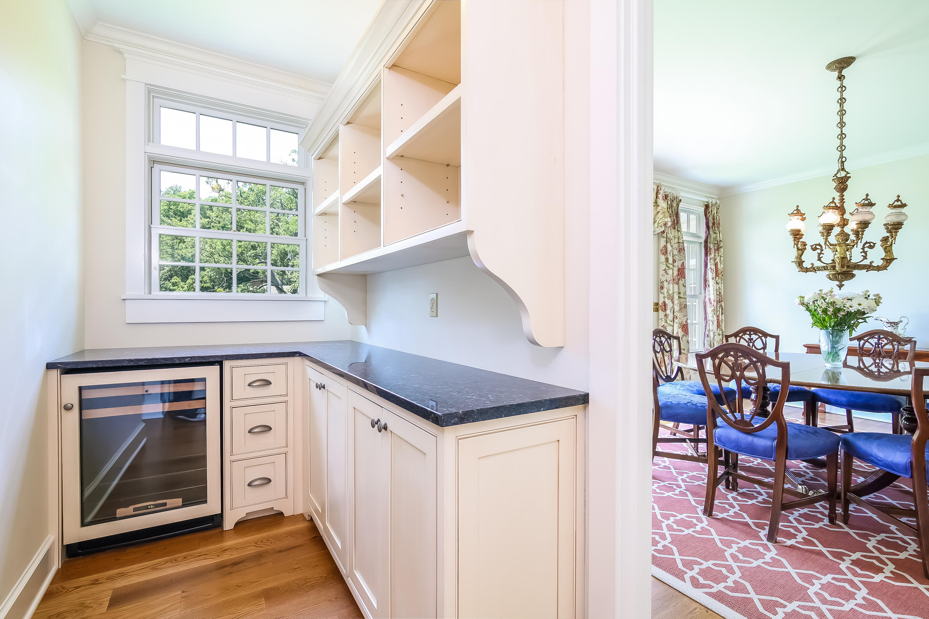 65 Goodwives River Road Darien, CT 06820 - Photo 12 of 36 a kitchen with stainless steel appliances granite countertop a stove a sink and a microwave