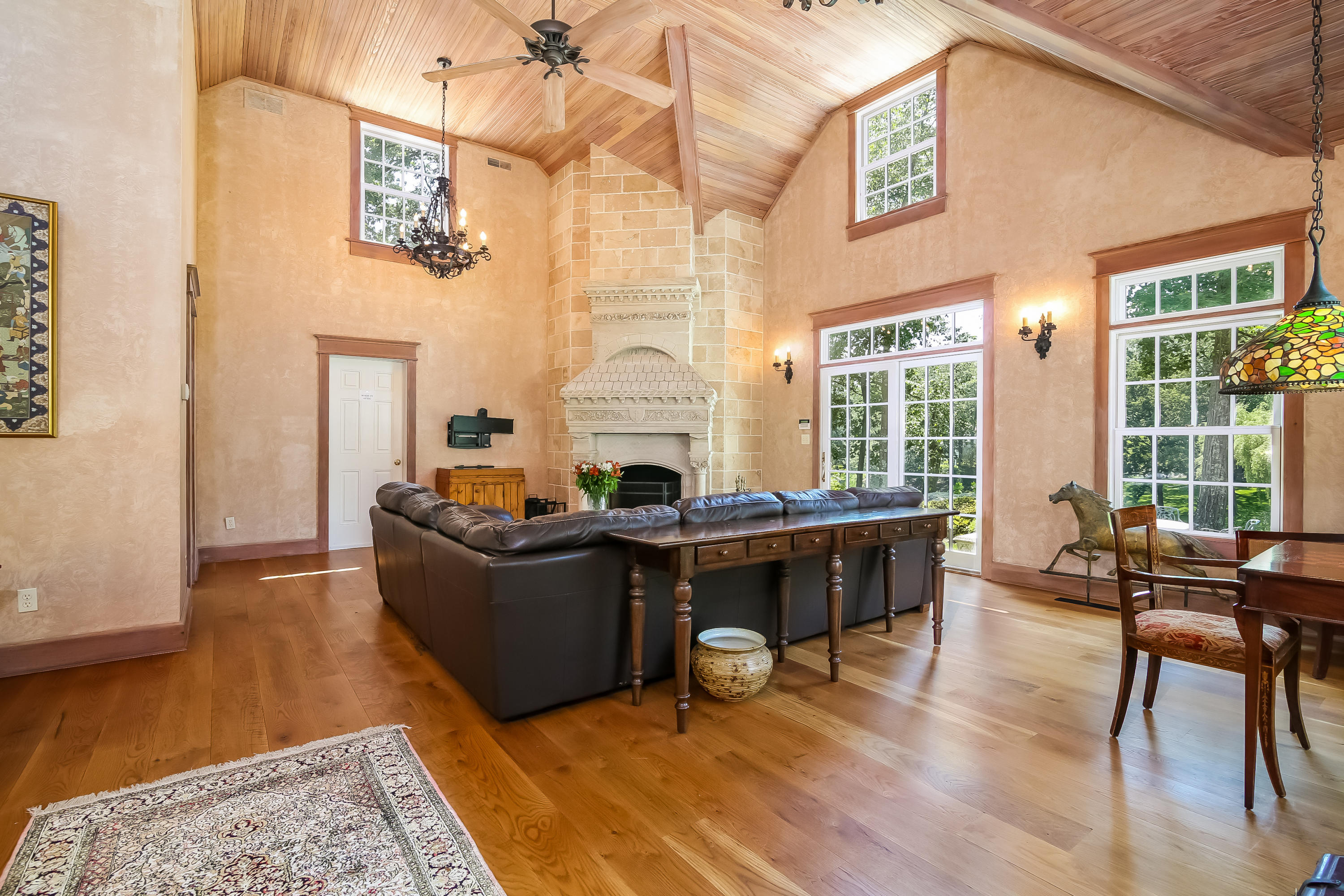 65 Goodwives River Road Darien, CT 06820 - Photo 7 of 36 a living room with furniture and a large window