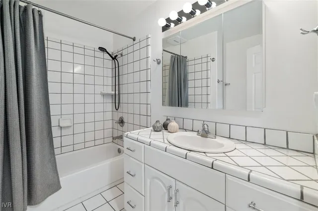 a bathroom with a sink and a bathtub