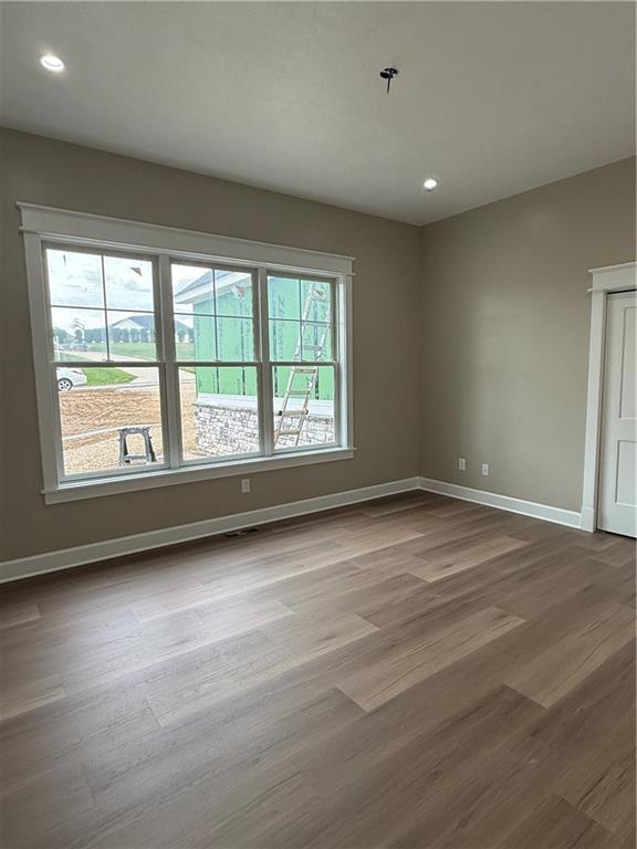 136 Huckleberry Road Indiana, PA 15701 - Photo 11 of 20 an empty room with wooden floor and windows