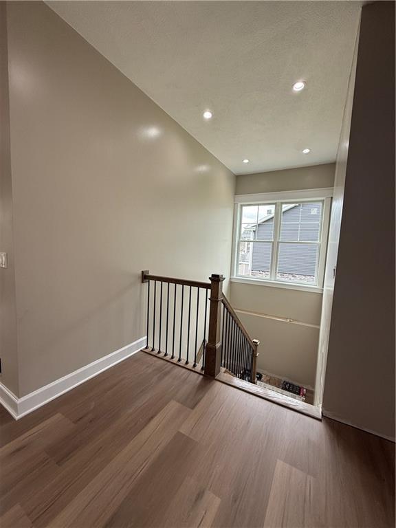 136 Huckleberry Road Indiana, PA 15701 - Photo 14 of 20 an empty room with wooden floor and windows