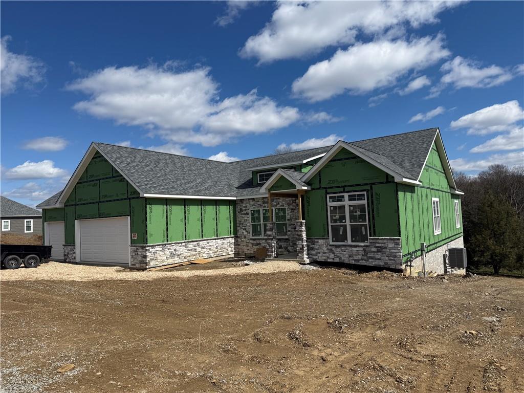 136 Huckleberry Road Indiana, PA 15701 - Photo 2 of 20 a front view of a house with a yard and garage