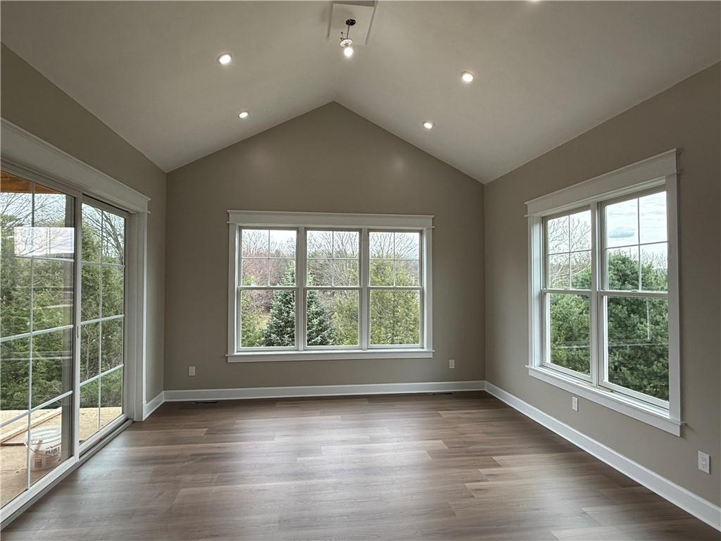 136 Huckleberry Road Indiana, PA 15701 - Photo 6 of 20 a view of an empty room with wooden floor and a window