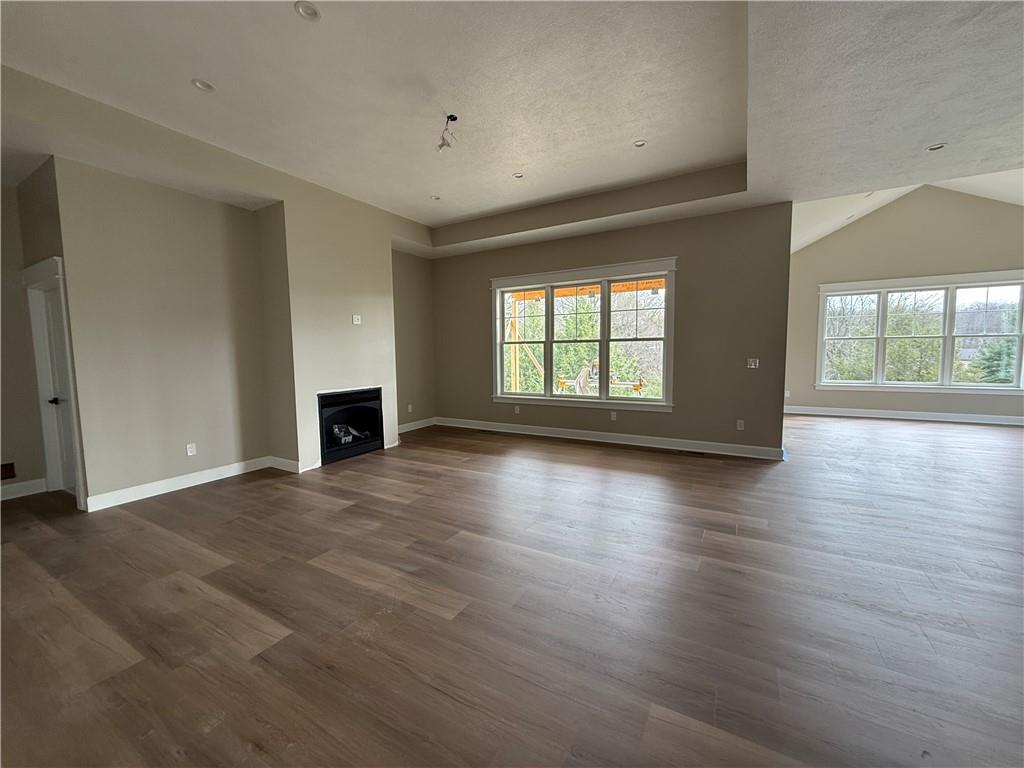 136 Huckleberry Road Indiana, PA 15701 - Photo 8 of 20 an empty room with wooden floor and windows