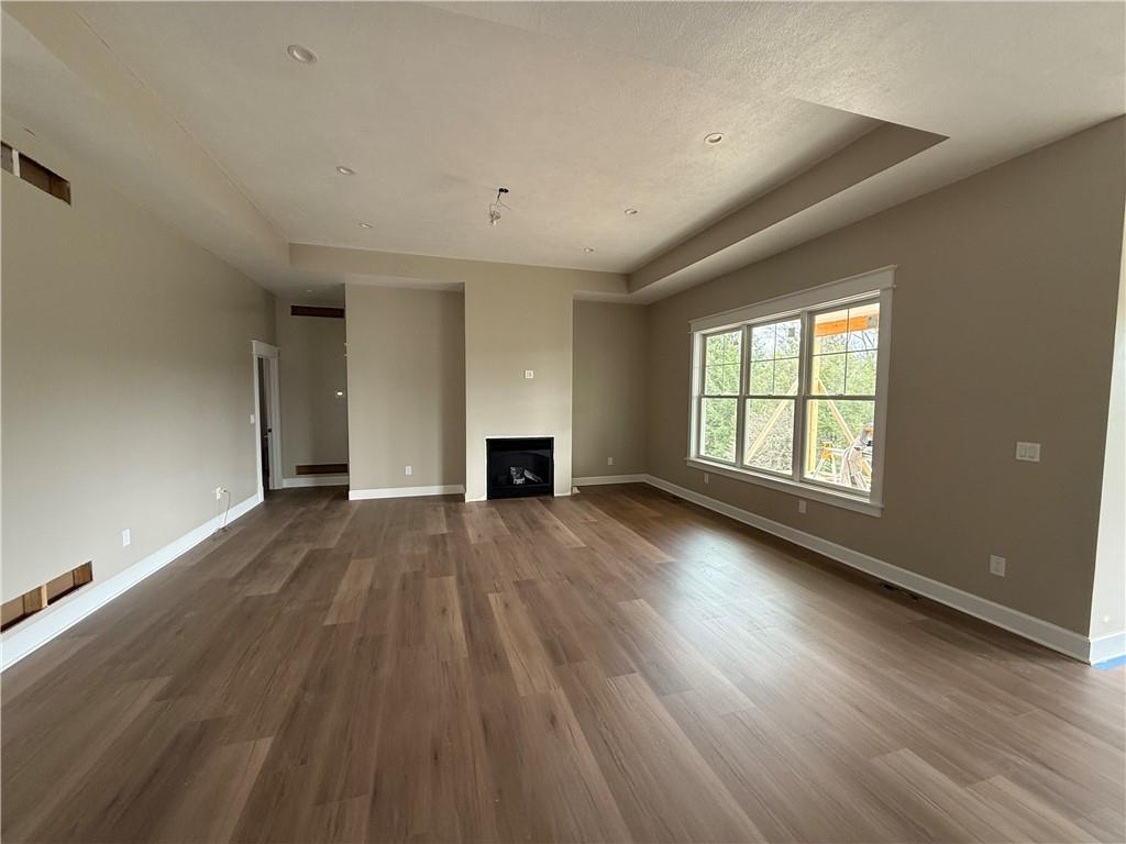 136 Huckleberry Road Indiana, PA 15701 - Photo 10 of 20 an empty room with wooden floor and windows