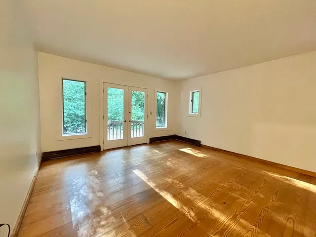 view of a room with wooden floor