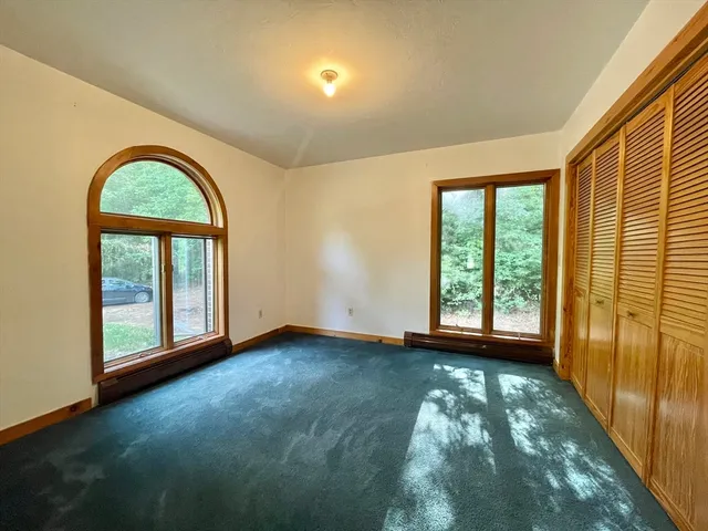 a bathroom with a bathtub and shower