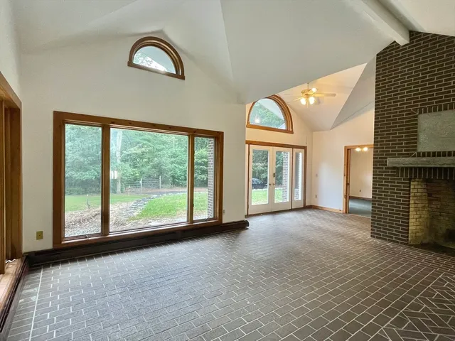 a view of a livingroom with a fireplace