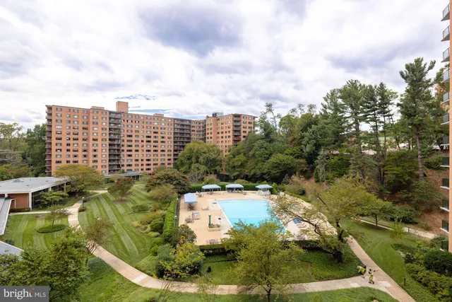 a view of a balcony with chairs