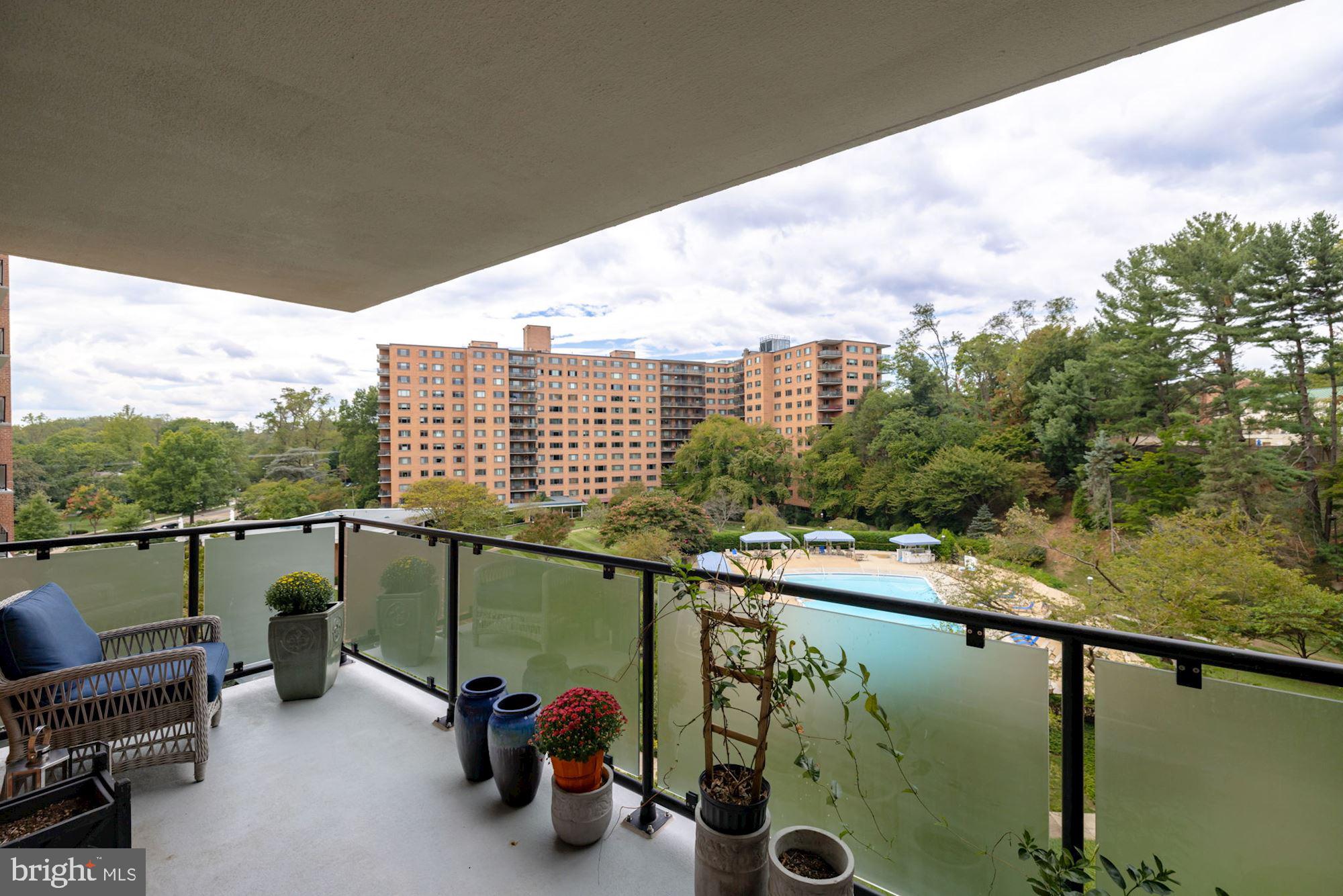 4201 Cathedral Avenue Northwest, Unit 620E Washington, DC 20016 - Photo 16 of 28 a view of a balcony with chairs