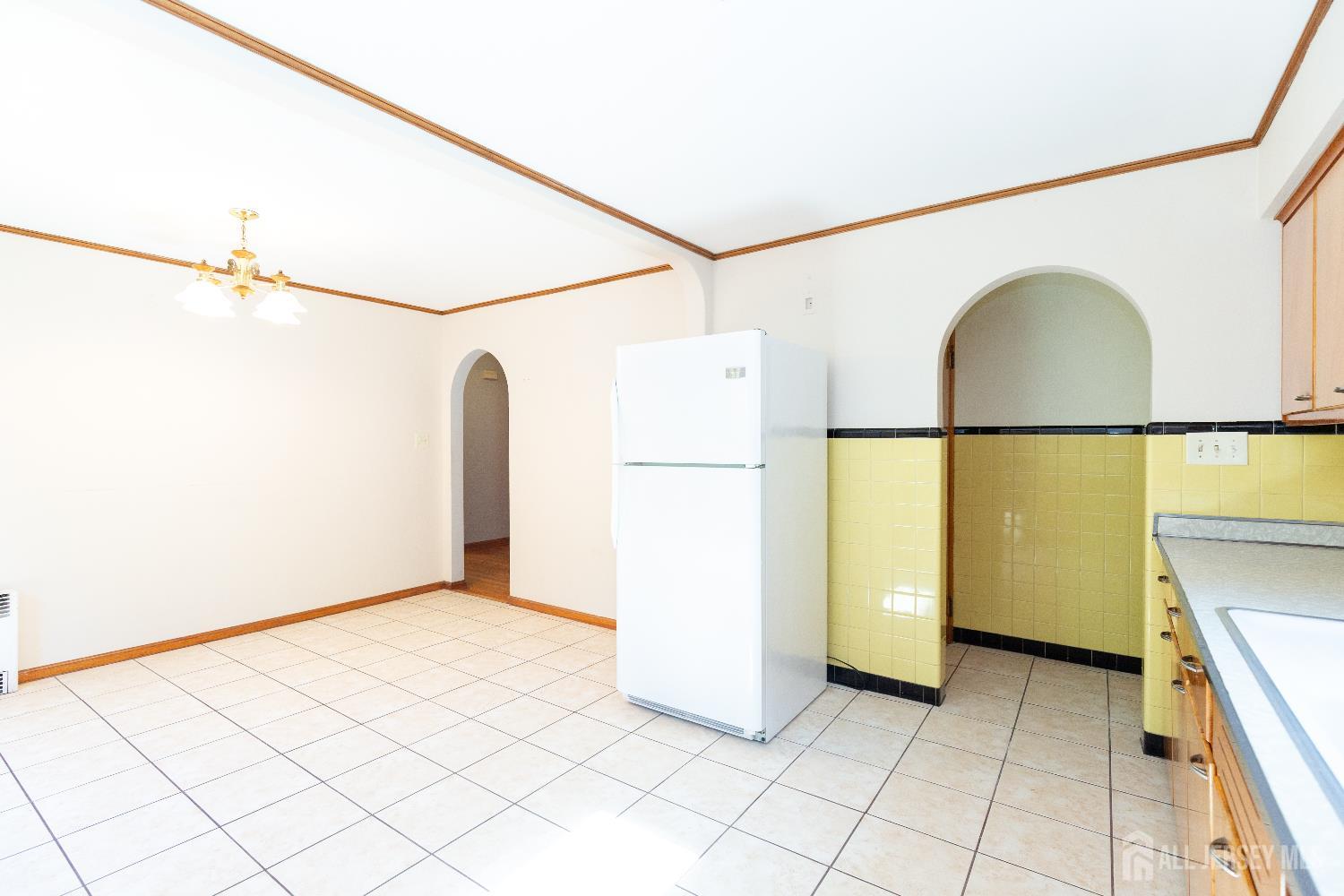2624 Tremley Point Road Linden, NJ 07036 - Photo 11 of 43 a view of a storage & utility room with washer and dryer