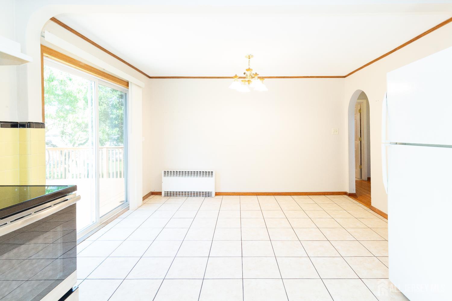 2624 Tremley Point Road Linden, NJ 07036 - Photo 12 of 43 a view of a room with a walk in closet and a large window