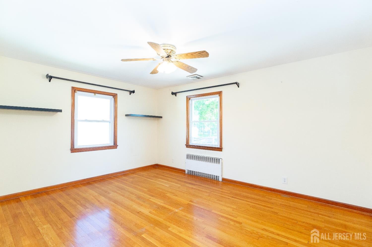 2624 Tremley Point Road Linden, NJ 07036 - Photo 13 of 43 a view of an empty room with a window