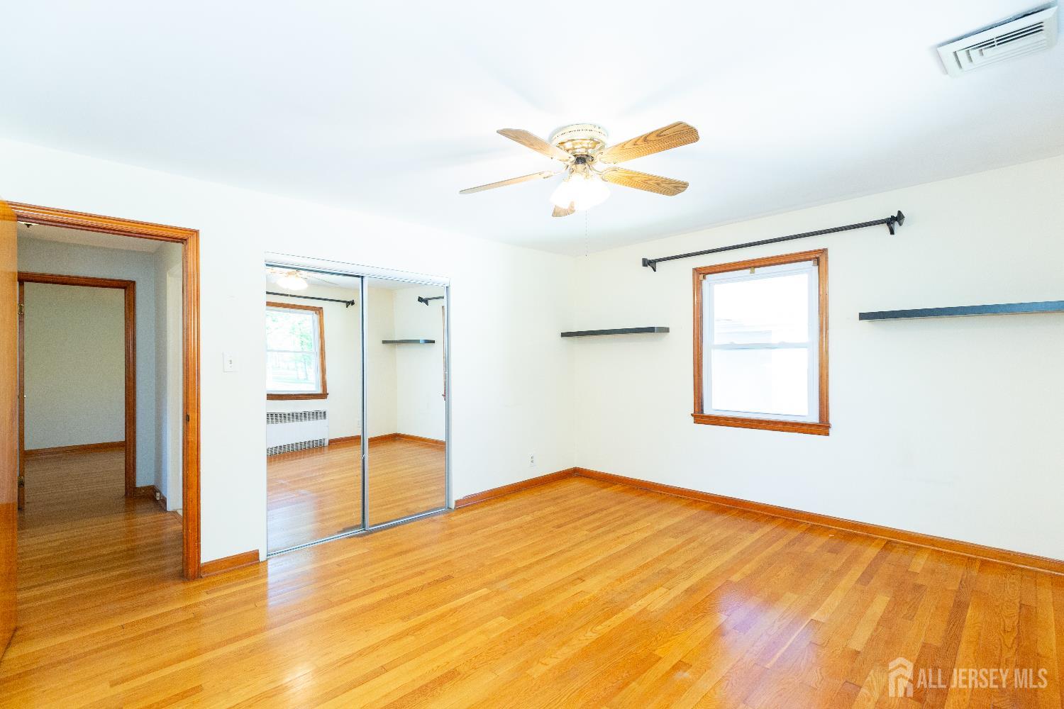 2624 Tremley Point Road Linden, NJ 07036 - Photo 14 of 43 a bedroom with a bed and a window