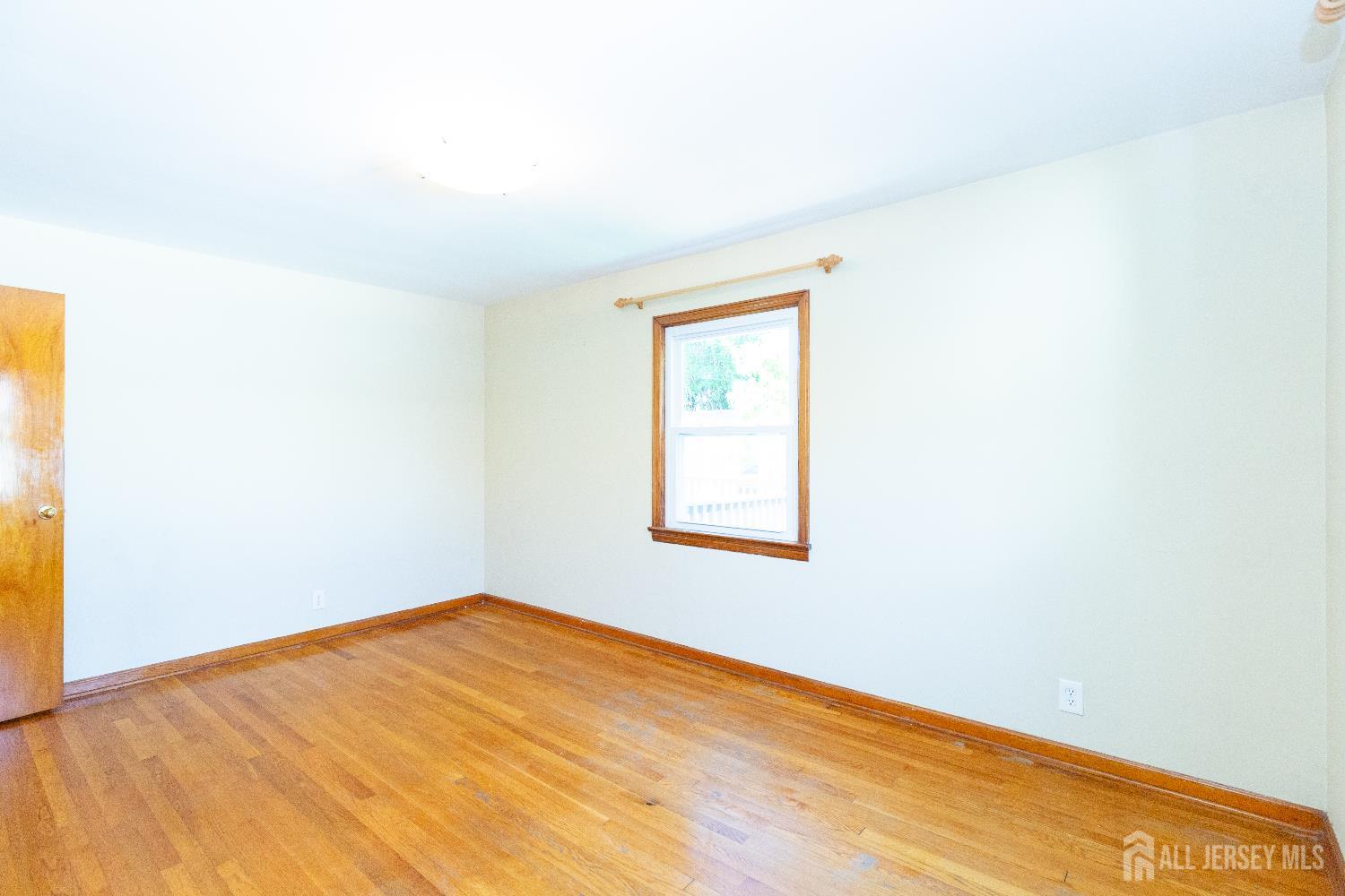 2624 Tremley Point Road Linden, NJ 07036 - Photo 20 of 43 an empty room with a window