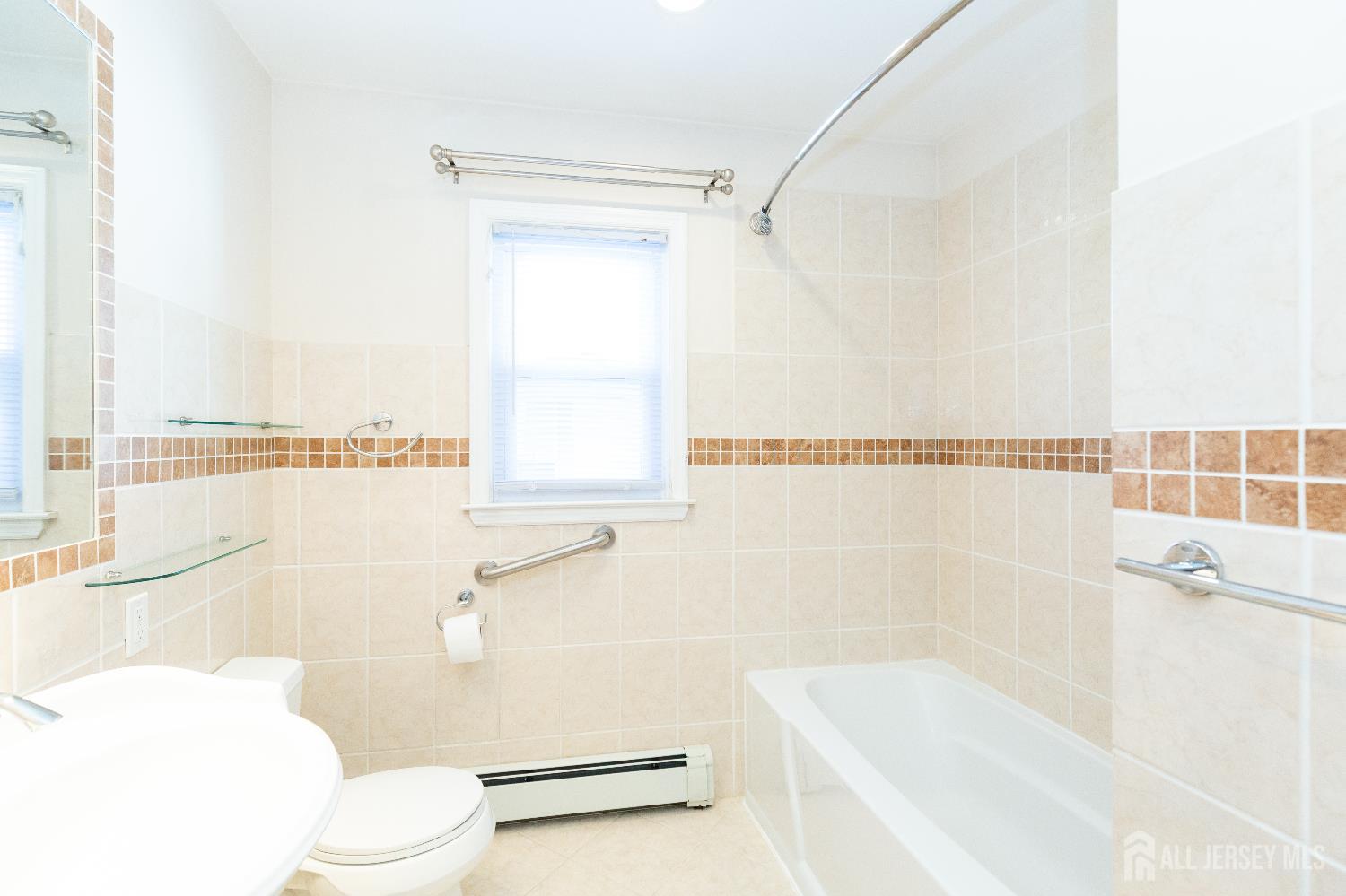 2624 Tremley Point Road Linden, NJ 07036 - Photo 22 of 43 a bathroom with a toilet and a bathtub