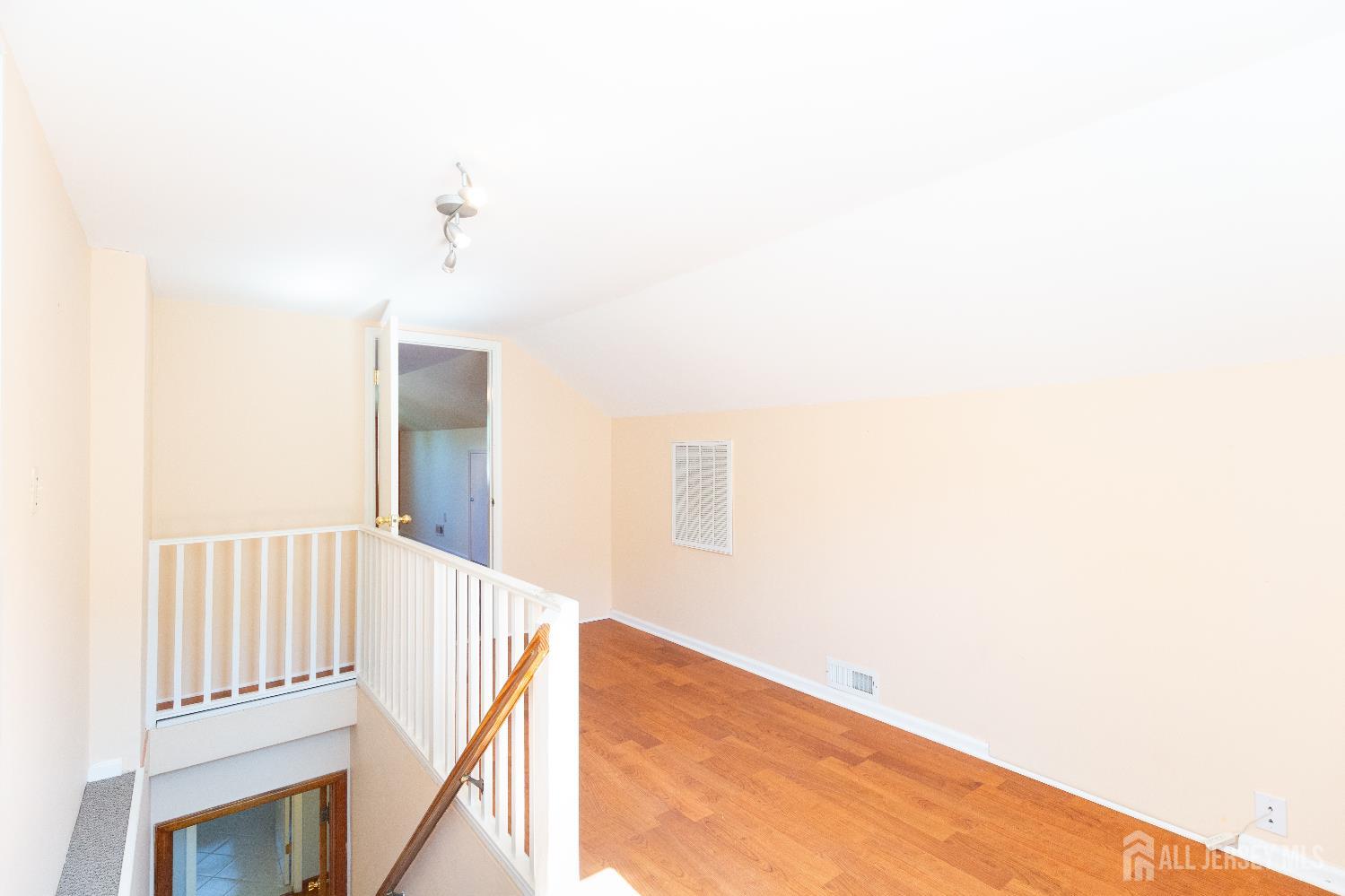 2624 Tremley Point Road Linden, NJ 07036 - Photo 25 of 43 a view of a hallway with stairs