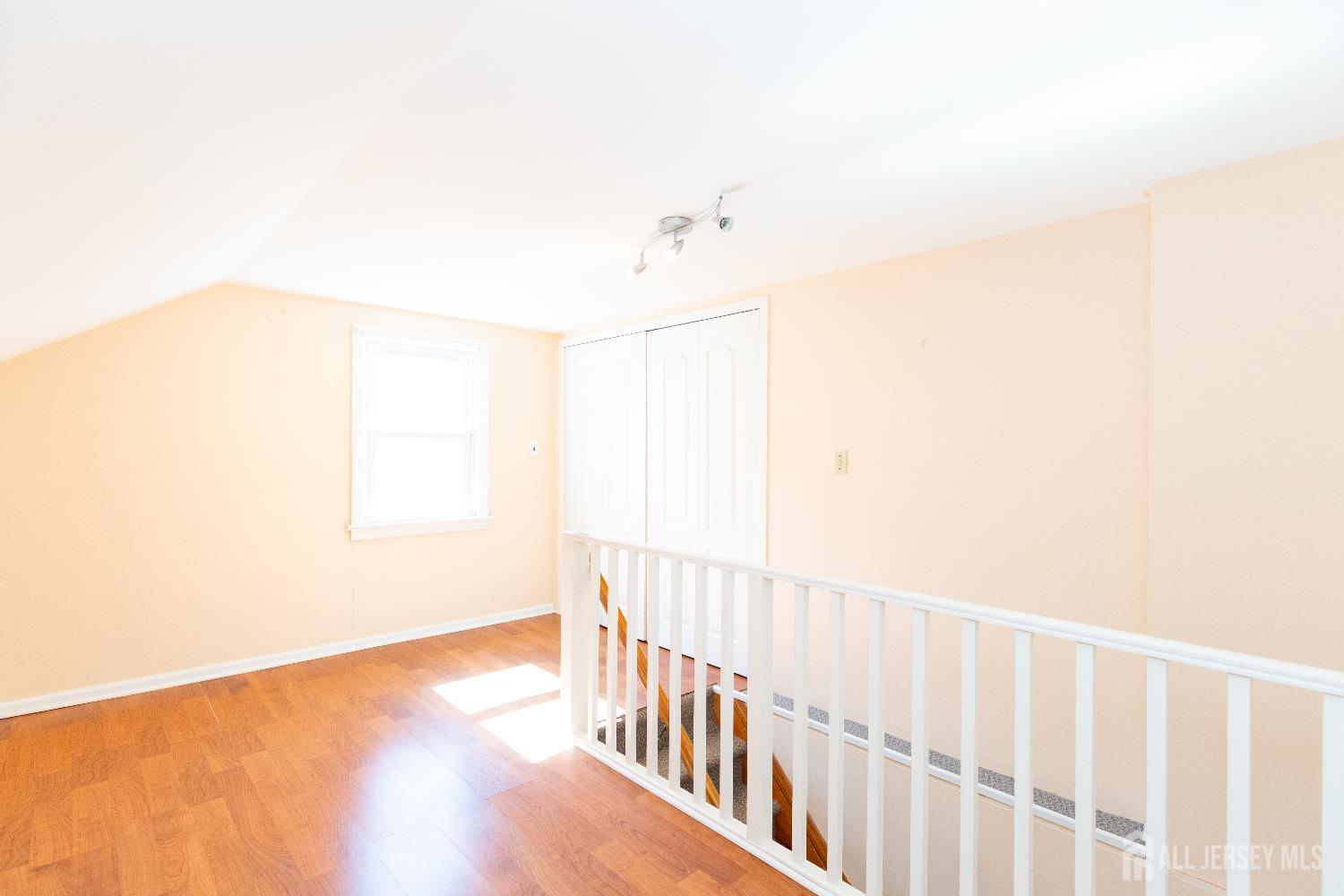 2624 Tremley Point Road Linden, NJ 07036 - Photo 27 of 43 a view of a hallway with wooden floor
