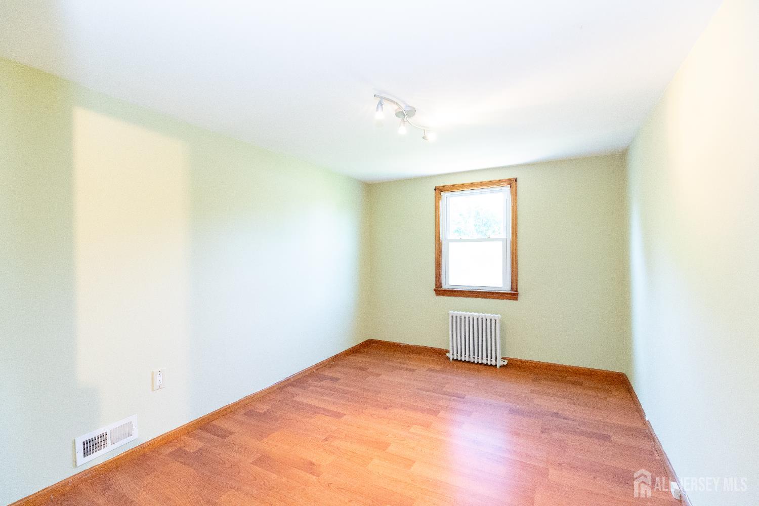 2624 Tremley Point Road Linden, NJ 07036 - Photo 32 of 43 an empty room with a window