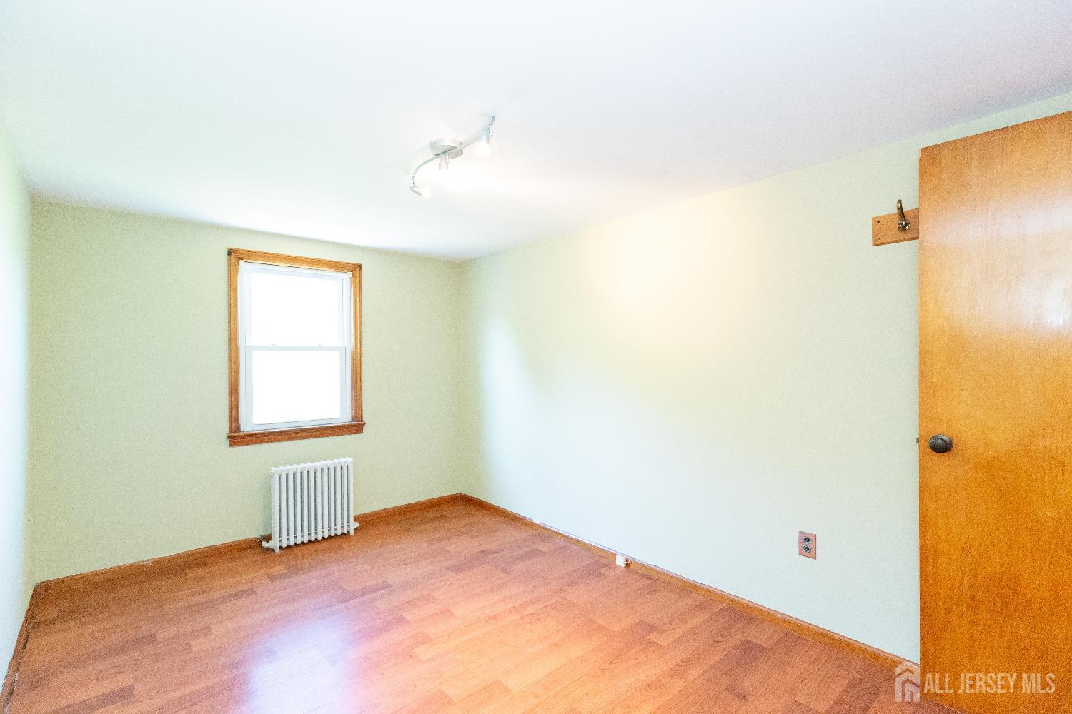 2624 Tremley Point Road Linden, NJ 07036 - Photo 33 of 43 an empty room with a window