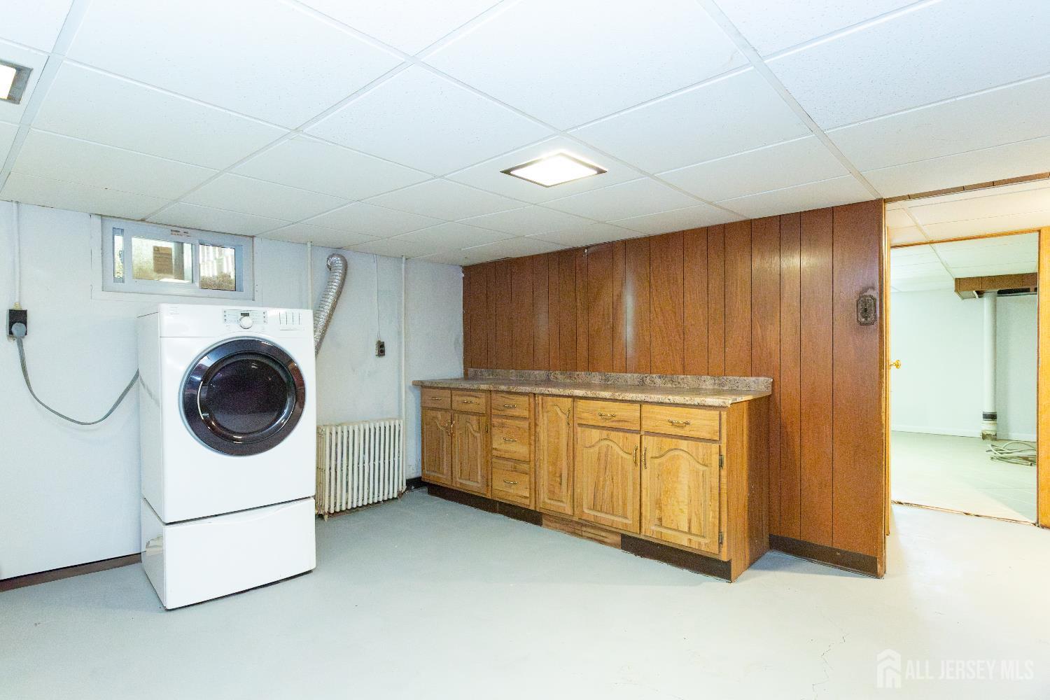 2624 Tremley Point Road Linden, NJ 07036 - Photo 37 of 43 a utility room with dryer and washer