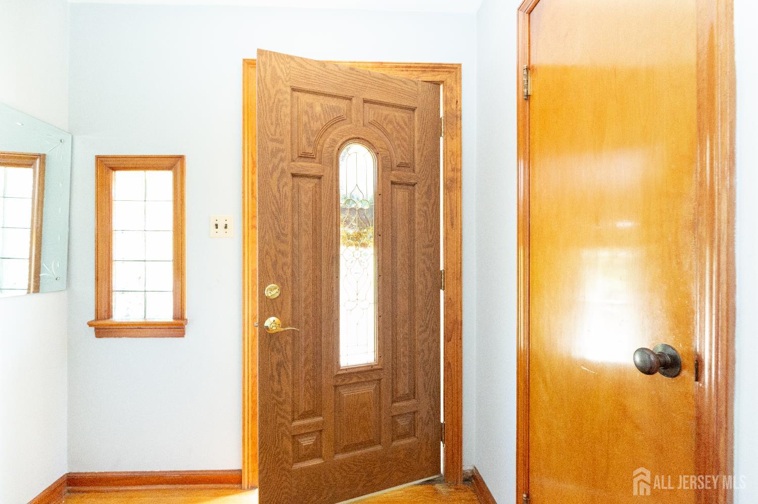 2624 Tremley Point Road Linden, NJ 07036 - Photo 4 of 43 a view of a bathroom with a glass door