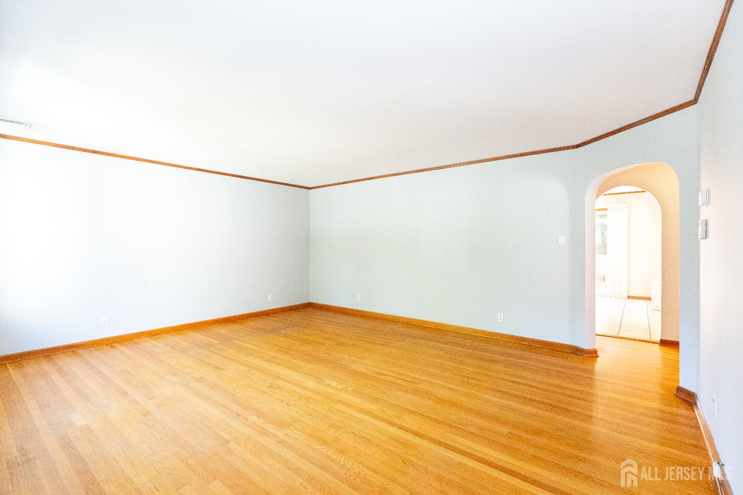 2624 Tremley Point Road Linden, NJ 07036 - Photo 5 of 43 a view of a big room with wooden floor