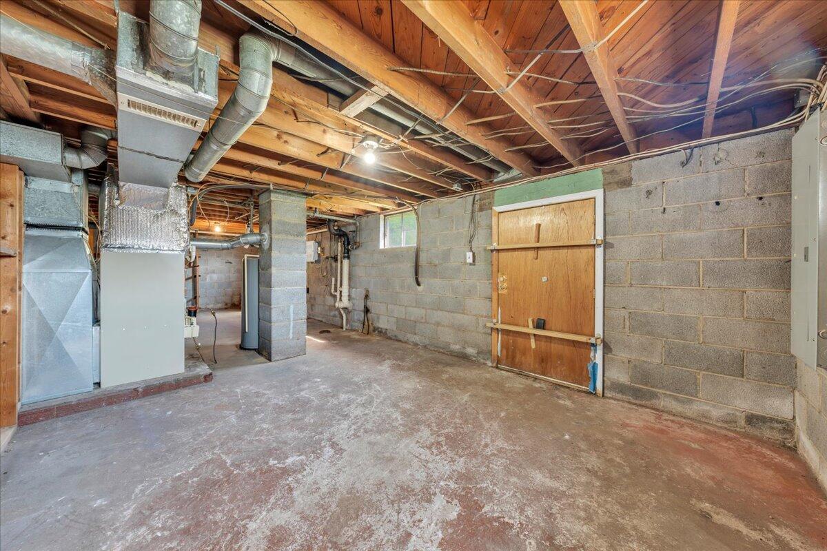 201 Long Avenue Covington, VA 24426 - Photo 23 of 43 a view of empty room with wooden walls
