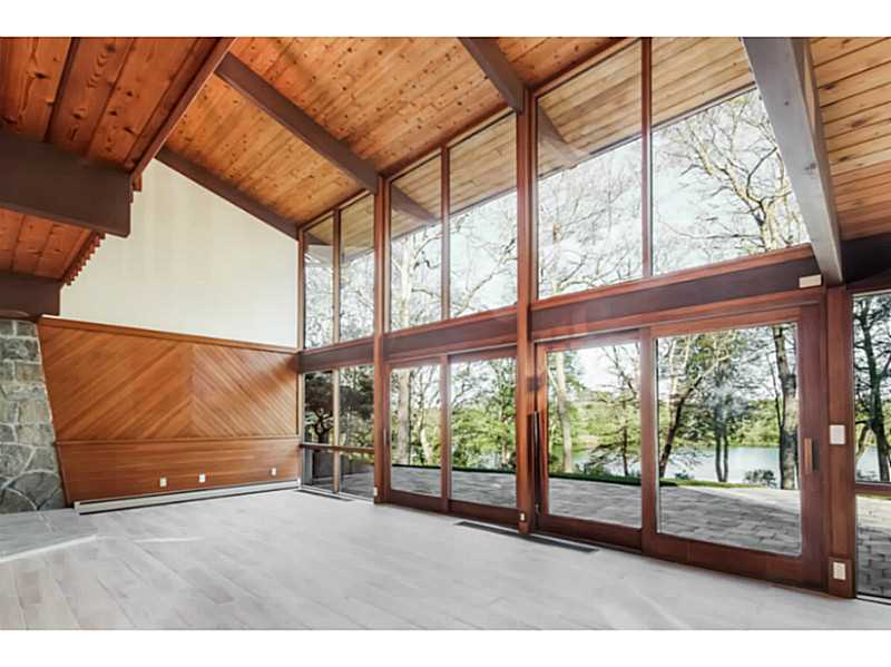 100 Mill Pond Road Exeter, RI 02822 - Photo 11 of 25 Den/Family/Great Room. Light filled great room overlooking the water.