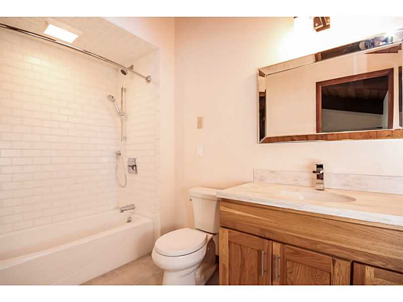 100 Mill Pond Road Exeter, RI 02822 - Photo 20 of 25 Bathroom. second floor bathroom - eucalyptus cabinetry and Corian counter tops.