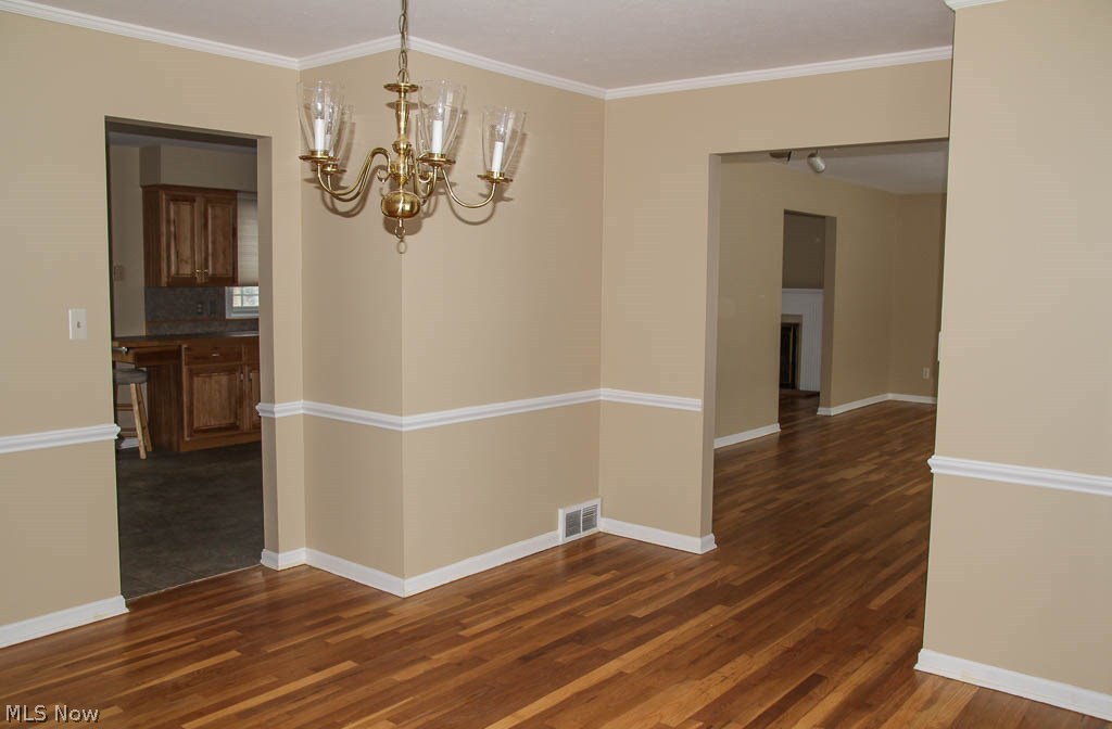 208 Harmon Road Aurora, OH 44202 - Photo 9 of 35 View from the dining room looking into the kitchen on the left and the living room toward the right.