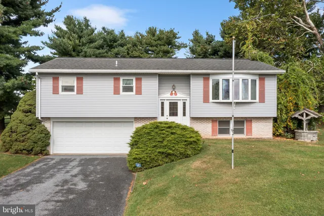 a house view with a garden space
