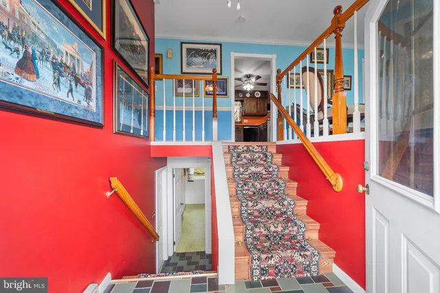 a very nice looking bedroom with a large window