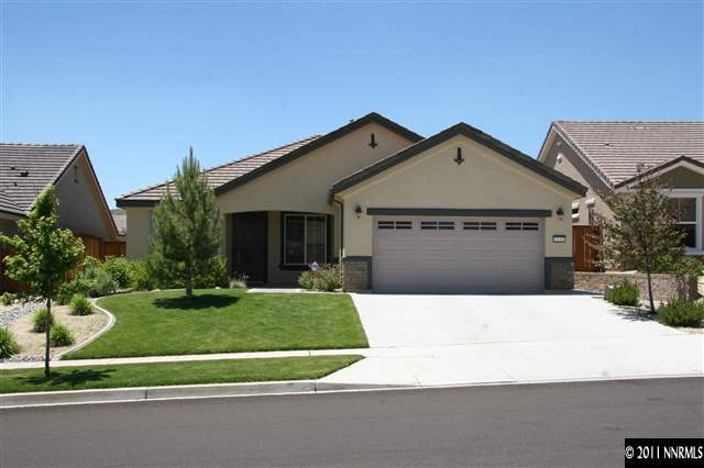 1335 Meridian Ranch Drive Reno, NV 89523 - Photo 1 of 7 a front view of a house with a yard