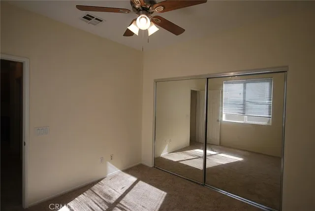 a view of an empty room with window