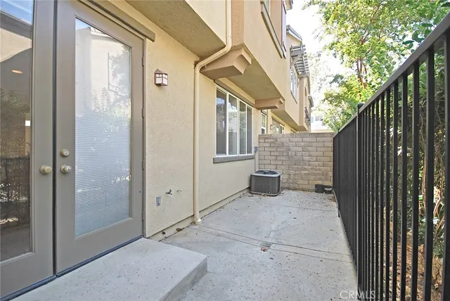 a view of a house with a backyard of the house