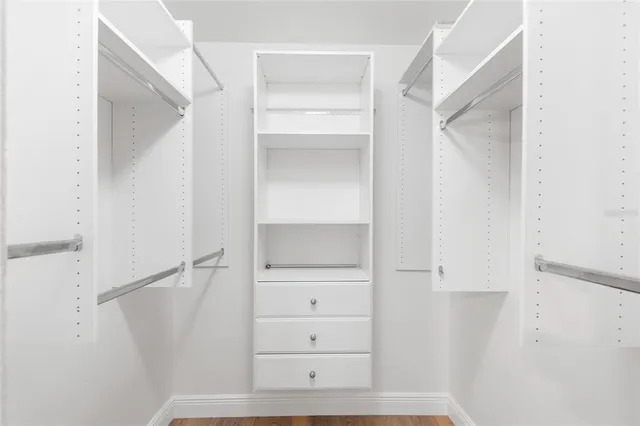 a view of an empty walk in closet