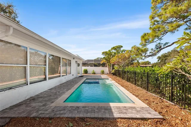 a view of a backyard with a patio