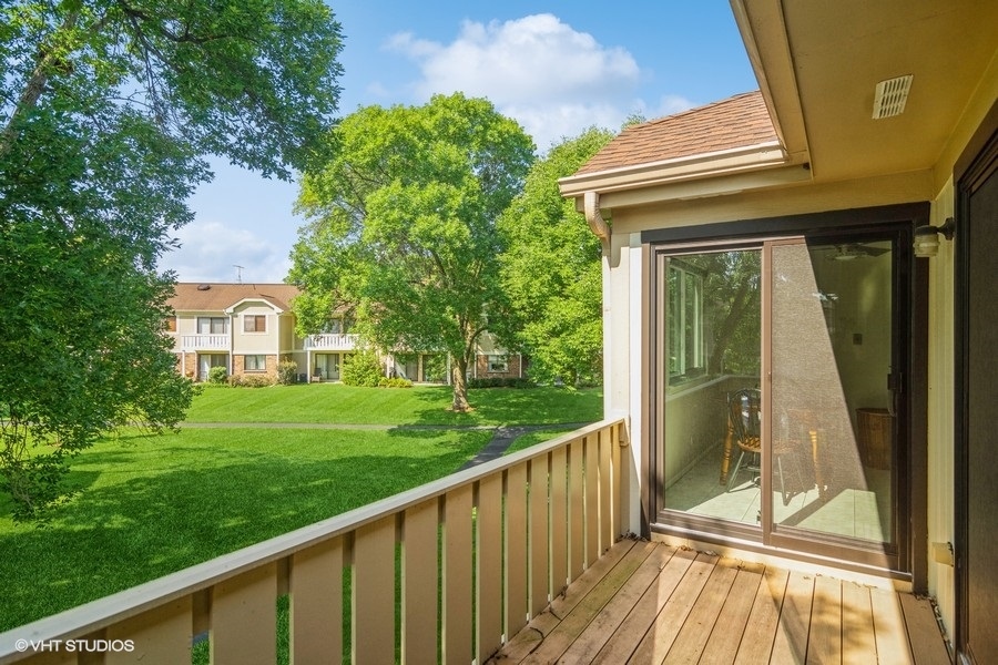 545 Greystone Lane, Unit A2 Wheeling, IL 60090 - Photo 15 of 21 a view of a balcony with a garden