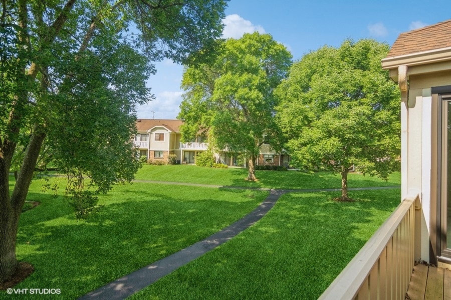 545 Greystone Lane, Unit A2 Wheeling, IL 60090 - Photo 17 of 21 a house view with a garden space