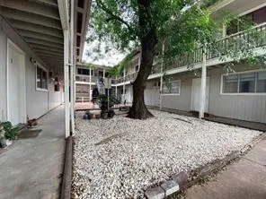 a backyard of a house with lots of green space