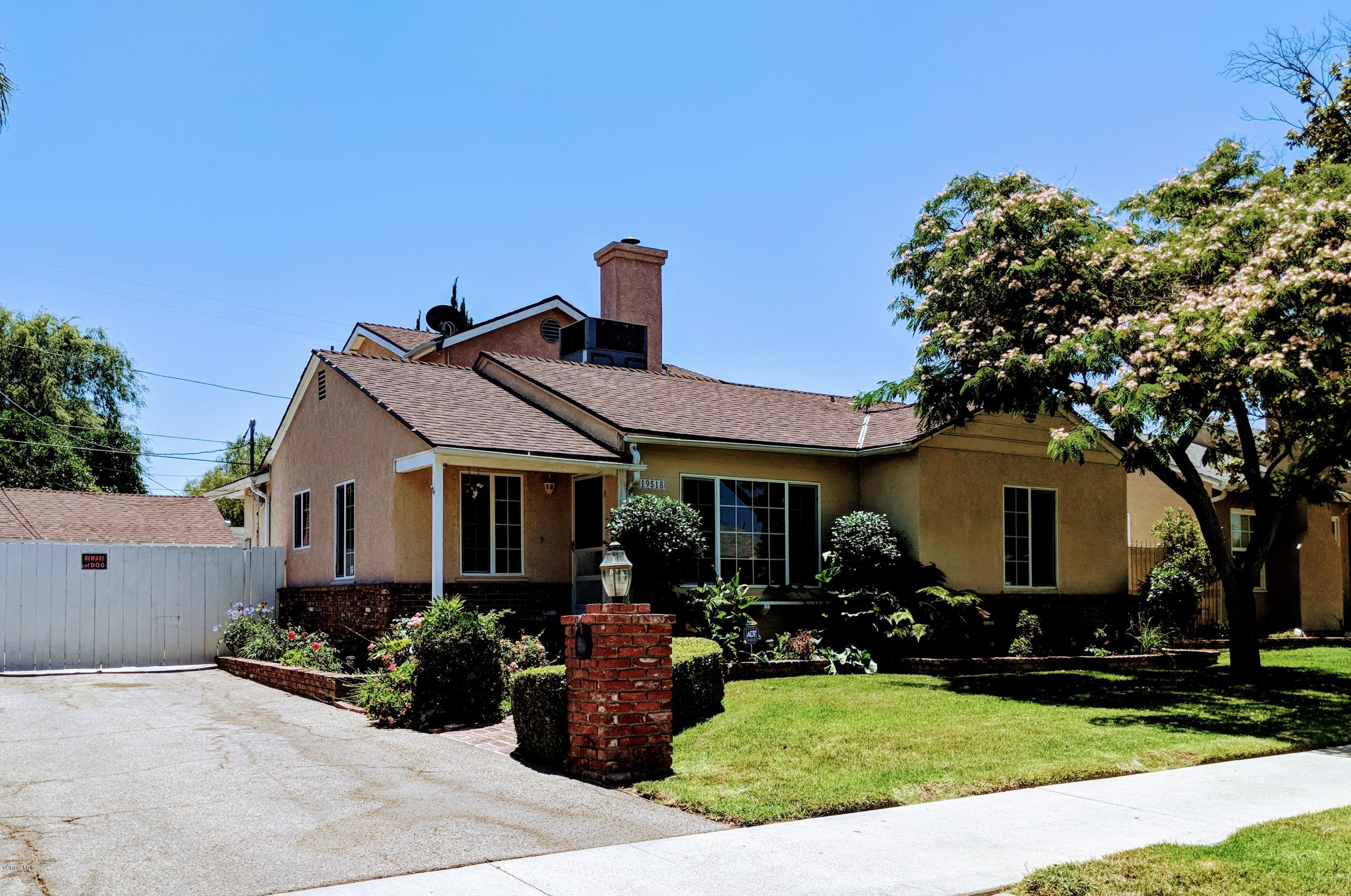 front view of house with a yard