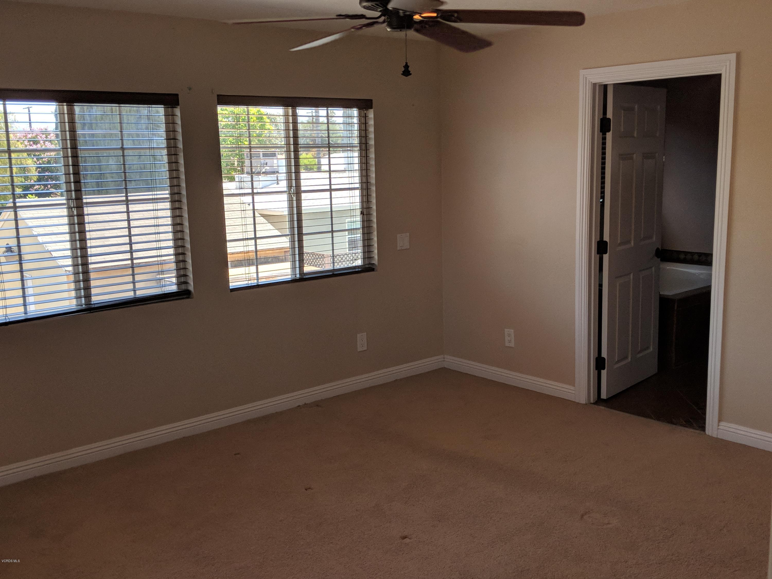 19518 Hart Street Reseda, CA 91335 - Photo 4 of 16 an empty room with a window